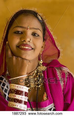 Smiling Woman In Traditional Rajasthani Sari And Jewellery View Large Photo Image Stock Image - Smiling Woman In Traditional Rajasthani Sari And Jewellery. Fotosearch