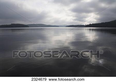 Stock Photo - Smoke Lake On A Cloudy Morning, Algonquin Park, Ontario, Canada. Fotosearch