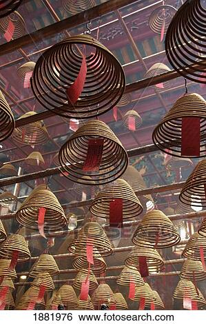 Smoking Incense Spirals At The Man Mo Temple In Hong Kong, Close Up View Large Photo Image Stock Photograph - Smoking Incense Spirals At The Man Mo Temple In Hong Kong, Close Up. Fotosearch