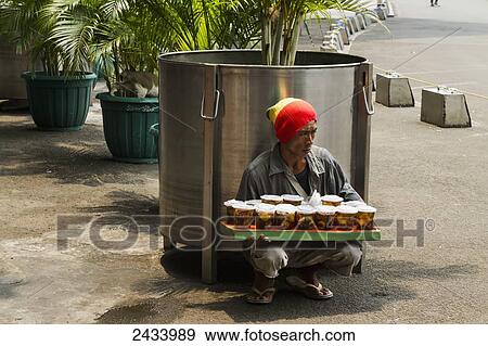 Snack vendor, Jakarta, Java, Indonesia View Large Photo Image Stock Photo - Snack vendor, Jakarta, Java, Indonesia. Fotosearch