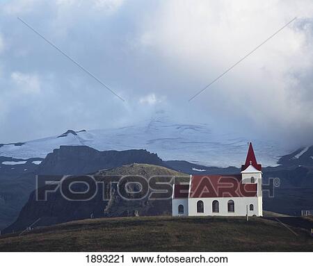Stock Image - Snaefellsjokull Glacier And Church At Hellisandur-Rif. Fotosearch