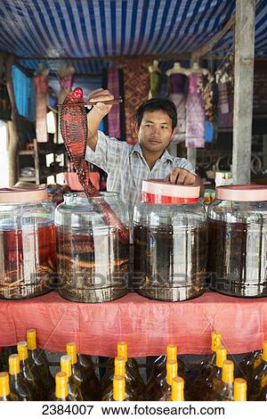 Stock Photo - Snake Whisky for sale; Laos. Fotosearch