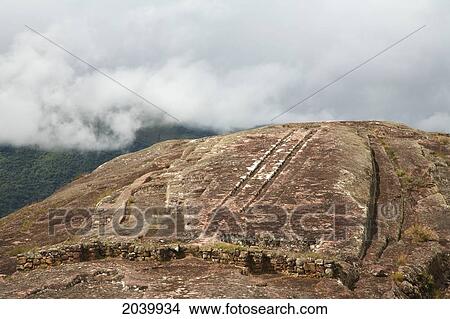 Snake's Back Channeling On The Carved Stone Hill Of El Fuerte De Samaipata, Santa Cruz Department, Bolivia View Large Photo Image Picture - Snake's Back Channeling On The Carved Stone Hill Of El Fuerte De Samaipata, Santa Cruz Department, Bolivia. Fotosearch