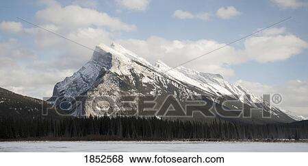 Stock Photo - Snow-Capped Mountain, Banff, Alberta, Canada. Fotosearch