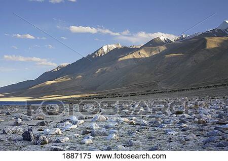 Stock Photography - Snow Capped Mountains And Rock Formations At Tso Pangong. Fotosearch