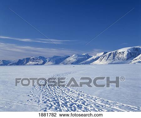 Stock Image - Snow Covered Landscape Of Uummannaq Fjord. Fotosearch