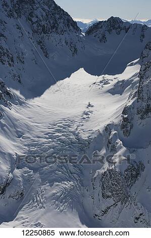 Stock Photography - Snow covered mountain surface; New Zealand. Fotosearch