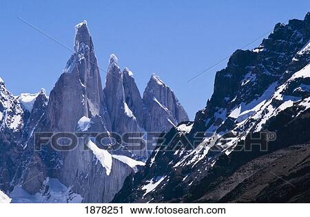 Stock Image - Snow Covered Mountains. Fotosearch