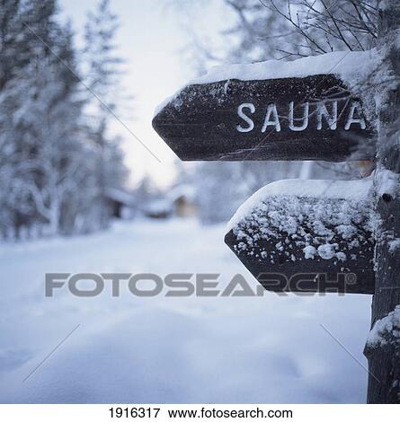 Stock Photo - Snow-Covered Sauna Sign. Fotosearch
