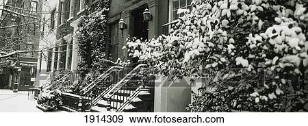 Stock Photo - Snow Covered Steps Of Townhouse. Fotosearch