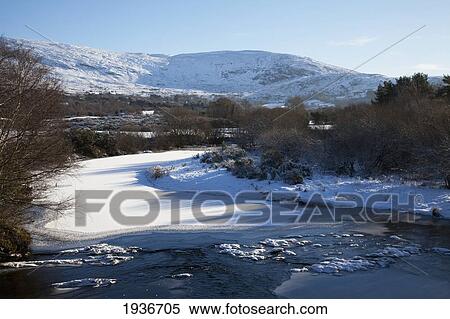 Snow On The Hills And On A Frozen River Near Bonane; County Kerry Ireland View Large Photo Image Stock Photography - Snow On The Hills And On A Frozen River Near Bonane; County Kerry Ireland. Fotosearch