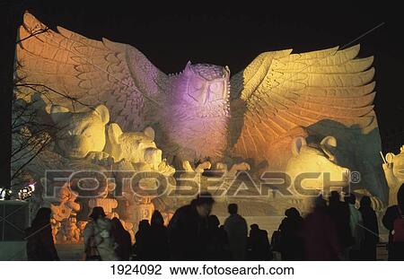 Stock Image - Snow Sculpture At Night. Fotosearch