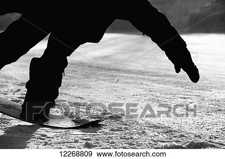 Stock Photo - Snowboarding; Haines, Alaska, United States of America. Fotosearch