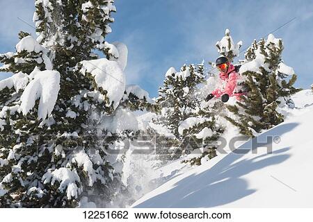 Snowboarding in powder snow; St. Moritz, Graubunden, Switzerland View Large Photo Image Stock Image - Snowboarding in powder snow; St. Moritz, Graubunden, Switzerland. Fotosearch