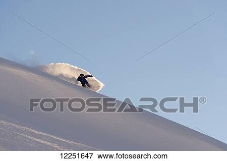 Snowboarding in powder snow; St. Moritz, Graubunden, Switzerland View Large Photo Image Stock Photo - Snowboarding in powder snow; St. Moritz, Graubunden, Switzerland. Fotosearch