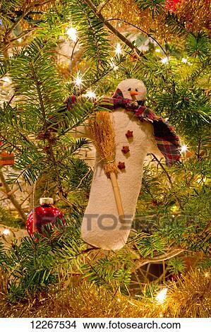 Picture - Snowman decoration on a Christmas tree; Chilliwack, British Columbia, Canada. Fotosearch