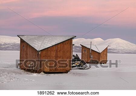 Snowmobile Outside Small Cabins Of Abisko Ark Hotel View Large Photo Image Stock Image - Snowmobile Outside Small Cabins Of Abisko Ark Hotel. Fotosearch