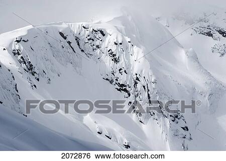 Stock Photograph - Snowy Ridge, Cascade Mountains, British Columbia. Fotosearch