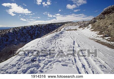 Stock Photograph - Snowy Road. Fotosearch
