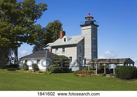 Stock Image - Sodus Point Lighthouse Maritime Museum; Sodus Point, New York State, Usa. Fotosearch