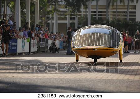 Solar car departing on the road; Darwin, Australia View Large Photo Image Stock Photo - Solar car departing on the road; Darwin, Australia. Fotosearch