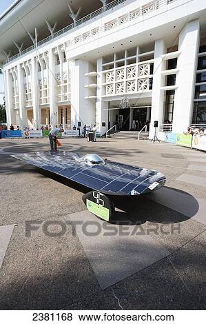 Stock Photo - Solar car preparing to depart; Darwin, Australia. Fotosearch