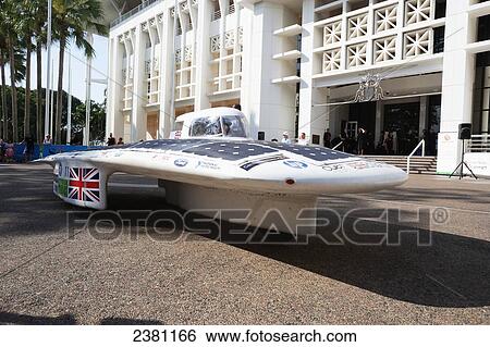 Stock Photograph - Solar car preparing to depart; Darwin, Australia. Fotosearch