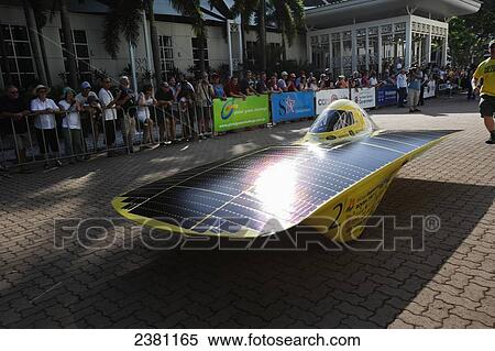 Stock Photography - Solar car preparing to depart; Darwin, Australia. Fotosearch