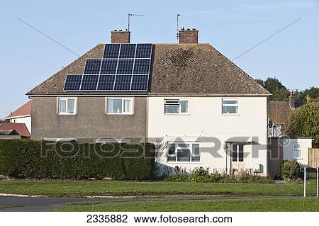Solar Panels On Half Of Roof Of Semi-Detached House; Solva Village, Pembrokeshire Coast Path, Wales, United Kingdom View Large Photo Image Stock Image - Solar Panels On Half Of Roof Of Semi-Detached House; Solva Village, Pembrokeshire Coast Path, Wales, United Kingdom. Fotosearch
