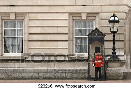 Stock Photograph - Soldier Guarding Buckingham Palace. Fotosearch