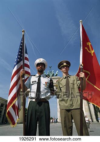 Stock Image - Soldiers In Front Of Brandenburg Gate. Fotosearch