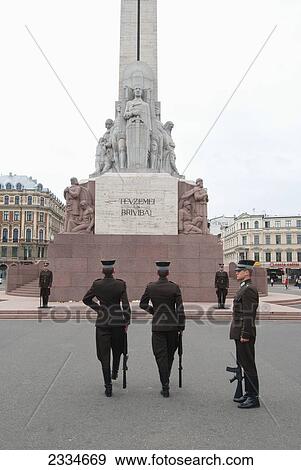 Soldiers On Honor Guard Under Monument; Riga, Latvia View Large Photo Image Stock Photo - Soldiers On Honor Guard Under Monument; Riga, Latvia. Fotosearch