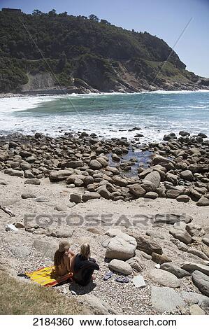 South Africa, Garden Route, Couple On Beach; Victoria Bay View Large Photo Image Stock Image - South Africa, Garden Route, Couple On Beach; Victoria Bay. Fotosearch