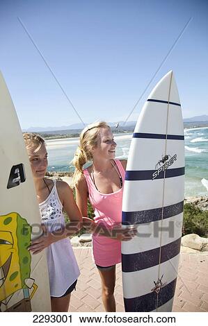 South Africa, Garden Route, Girls Holding Surfboards On Beach; Plettenberg Bay View Large Photo Image Stock Image - South Africa, Garden Route, Girls Holding Surfboards On Beach; Plettenberg Bay. Fotosearch