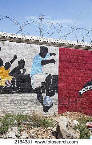 Stock Image - South Africa, Garden Route, Port Elizabeth, Football Themed Murals On Walls; New Brighton. Fotosearch
