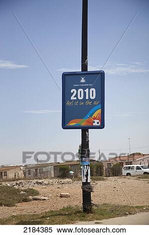 Stock Photography - South Africa, Garden Route, Port Elizabeth, Football Championship Themed Poster On Street Lamp; New Brighton. Fotosearch