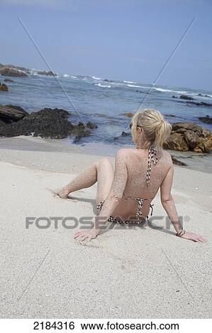 Stock Photograph - South Africa, Garden Route, Woman On Beach At Bushy Park Coastal Area; Port Elizabeth. Fotosearch