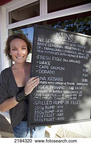 South Africa, Garden Route, Woman Showing Menu Blackboard In Soul Mate Fish Restaurant; Port Elizabeth View Large Photo Image Stock Image - South Africa, Garden Route, Woman Showing Menu Blackboard In Soul Mate Fish Restaurant; Port Elizabeth. Fotosearch