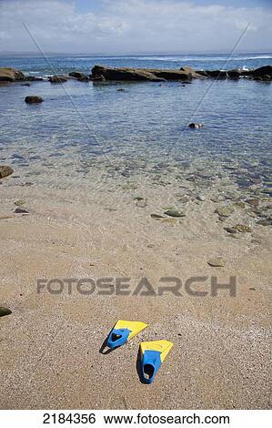 Stock Photograph - South Africa, Kids Flippers On Sand; Mossel Bay. Fotosearch