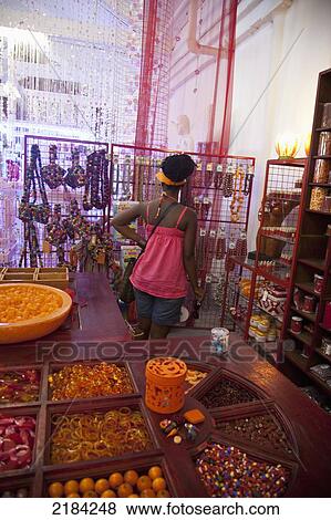 South Africa, Woodstock Area; Cape Town, Albert Road, The Old Biscuit Mill Weekend Market, Shopping For Beads View Large Photo Image Stock Photo - South Africa, Woodstock Area; Cape Town, Albert Road, The Old Biscuit Mill Weekend Market, Shopping For Beads. Fotosearch