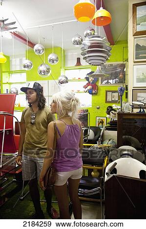 Stock Photo - South Africa, Woodstock Area; Cape Town, Albert Road, The Old Biscuit Mill Weekend Market, Shopping. Fotosearch
