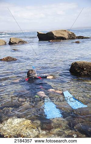Stock Photo - South Africa, Young Boy Snorkeling; Mossel Bay. Fotosearch
