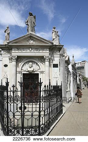 Stock Photograph - South American Woman At Recoleta Cemetery (La Recoleta, Cementerio De La Recoleta), Buenos Aires, Argentina, South America - Model Release. Fotosearch