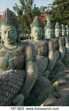 Stock Image - South East Asia, Cambodia, Siem Reap, Close Up Of An Artists' Sculptures On Display In Downtown Siem Reap.. Fotosearch