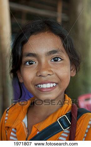 South East Asia, Cambodia, Siem Reap, Portrait Of A Young Local Girl. View Large Photo Image Stock Photo - South East Asia, Cambodia, Siem Reap, Portrait Of A Young Local Girl.. Fotosearch