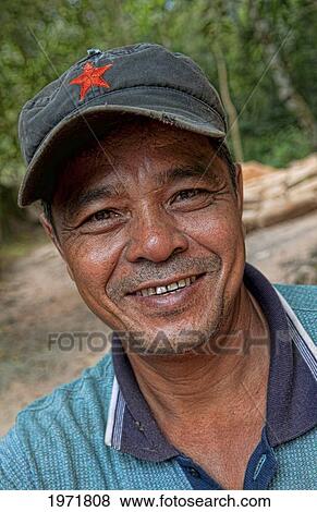 South East Asia, Cambodia, Siem Reap, Portrait Of A Local Man Outdoors. View Large Photo Image Stock Photo - South East Asia, Cambodia, Siem Reap, Portrait Of A Local Man Outdoors.. Fotosearch