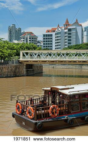 South East Asia, Singapore, View Of Downtown, Boat Traveling On River. View Large Photo Image Stock Image - South East Asia, Singapore, View Of Downtown, Boat Traveling On River.. Fotosearch