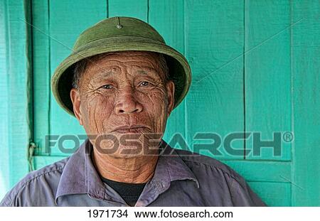 Picture - South East Asia, Vietnam, Ha Long Bay, Portrait Of An Elderly Vietnamese Fisherman.. Fotosearch
