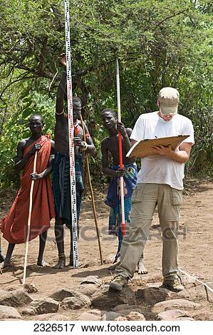 Stock Photo - South Western Ethiopia, Omo Valley, Southern Mursiland, Archaeologists; Dirikoro. Fotosearch