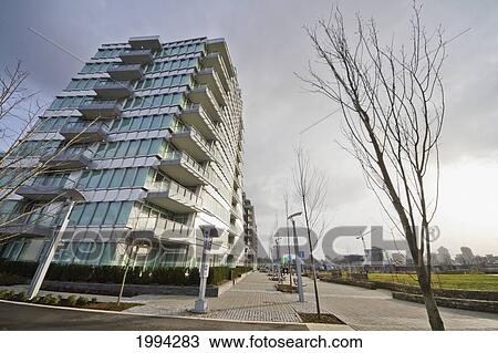 Stock Image - Southeast False Creek Seawall By The Vancouver Olympic Village, Vancouver, British Columbia, Canada. Fotosearch